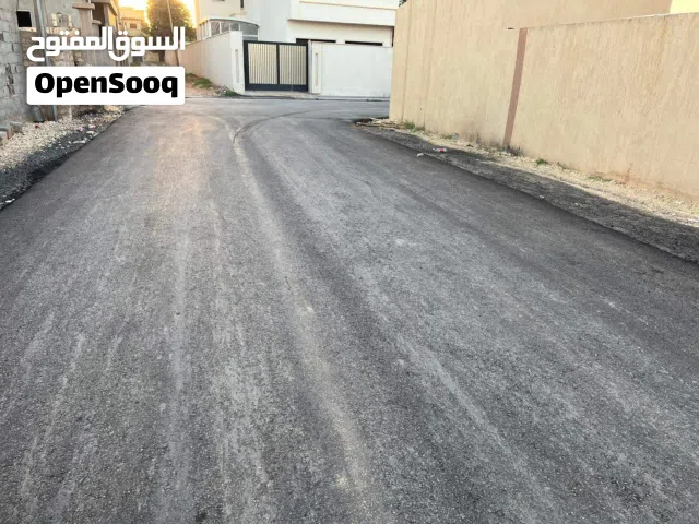 ارض للبيع في السراج خلف السوق زاد النافع