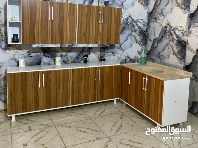 كاونتر خشب تركي قياس مترين ارضي وملحق وسنك متر وعشرين.