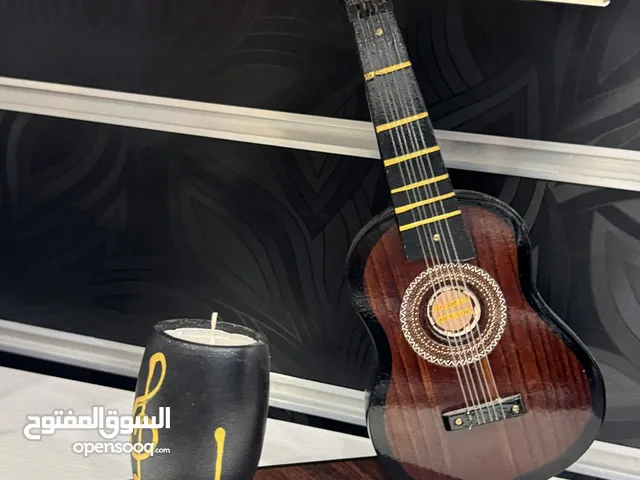 تحفه جيتار خشب شغل يدوي