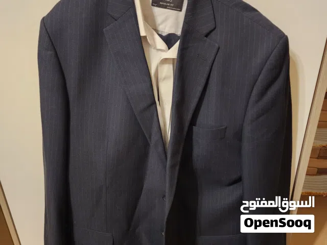 بدلة رجالية فاخرة (كحلي مقلم) مقاس 60- بحالة الوكالة (ملبوسة مرة واحدة فقط) + قميص وكرافتة جديدة