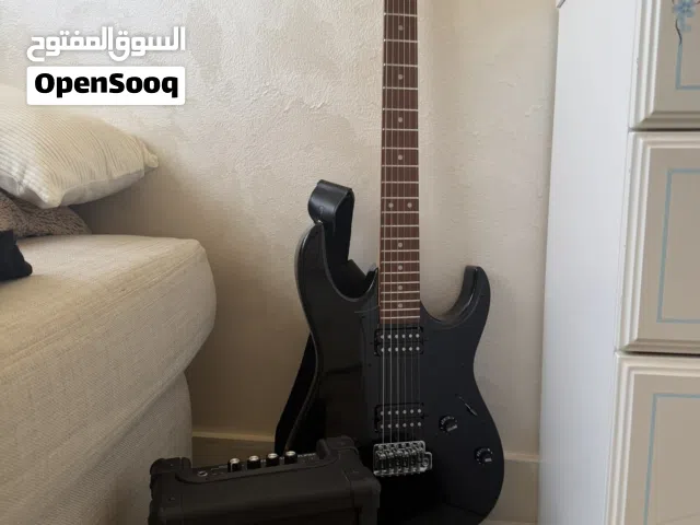 Ibanez Black Electric Guitar with amp and gig bag.