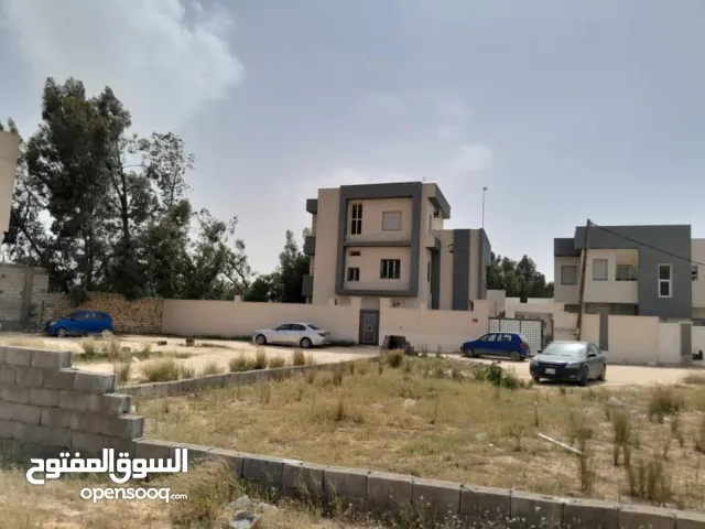 قطعة أرض للبيع في عين زاره طريق بئر الأسطى ميلاد خلف مستشفى الجلدية .