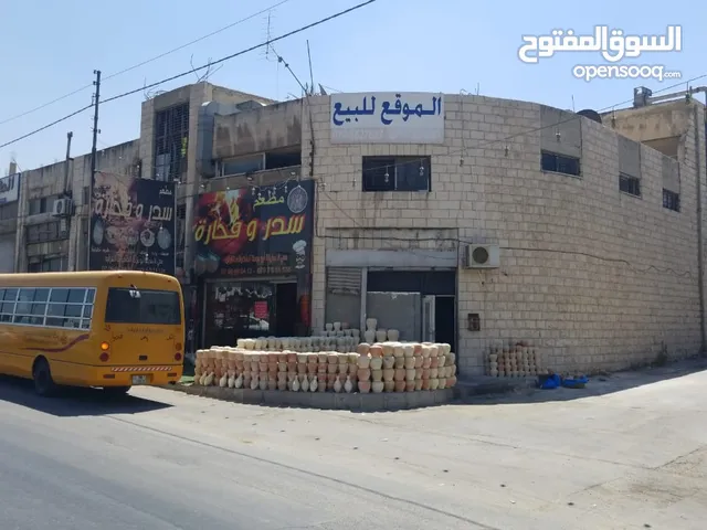 مصنع مع مستودعات على الشارع الرئيسي للبيع