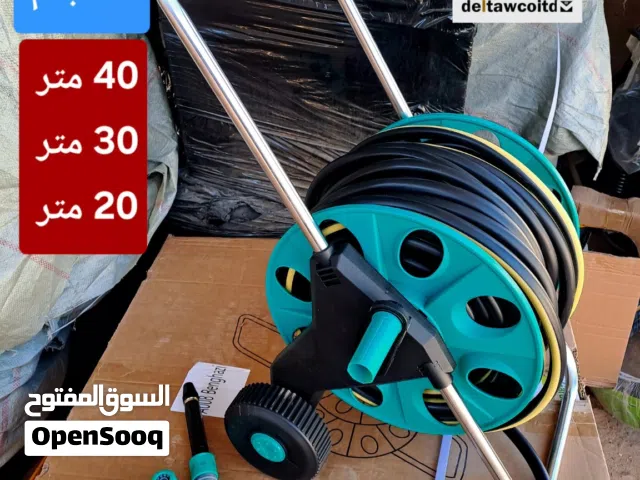 بكرة خرطوم معلقة ومجرورة مع كامل ملحقاتها
