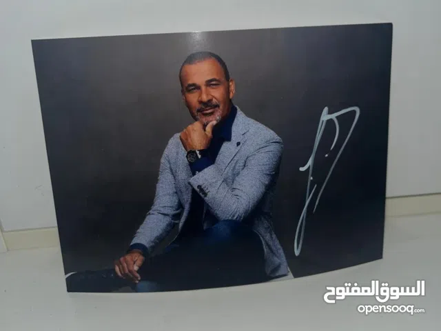 Ruud Gullits authenticated ball & picture signatures.