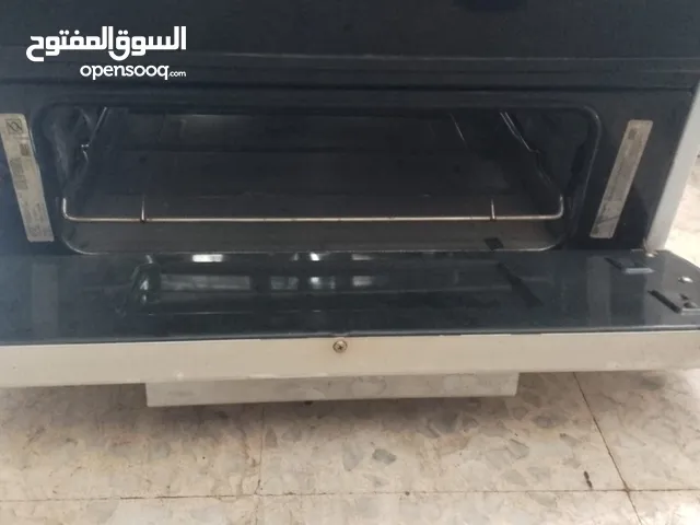 فرن أمريكي ماجيك شيف 4 عيون مع كهرباء و شعلة الكترونية