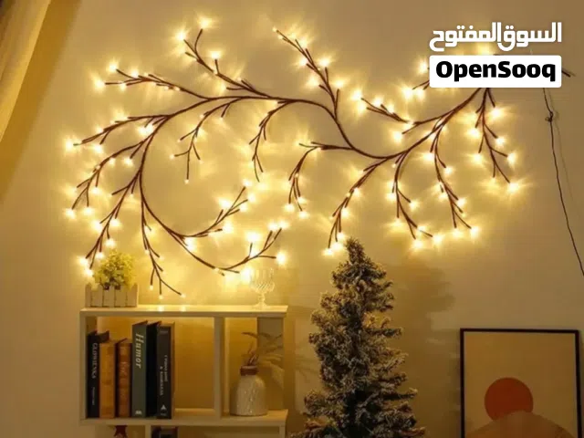 نشرة جدارية مضيئة على شكل غصن شجرة أضيفي لمسة دفء وأناقة لجدران منزلك مع هذه النشرة المضيئة المصممة