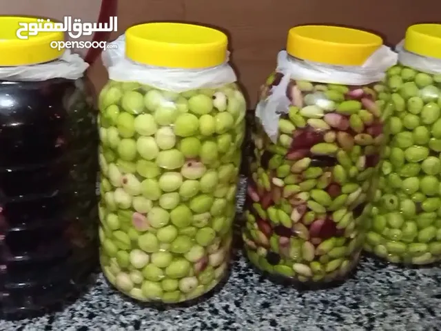 زيتون اخضر مكبوس الكيلو على دينار