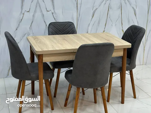 ميز طعام الارجل خشب زان متوفر مع 4 كراسي