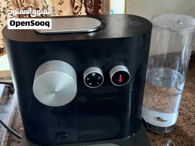 ماكنه نسبرسو كبسولات +توصيل+علبه كبسولات