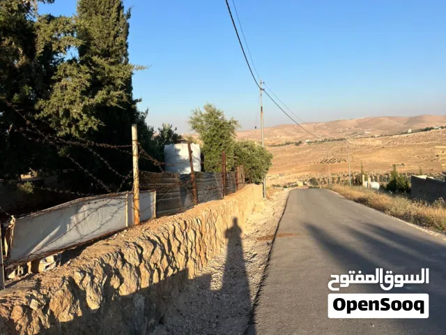 6 دونم مشجره زيتون مع  بيت ريفي 65  أجمل مناطق القنية - كيلو واحد عن الأوتوستراد جرش