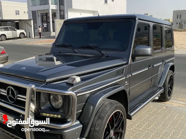 Silver Mercedes Benz G63 wagon