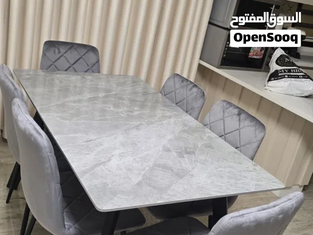 طاولات سفرة وجه رخام مع 6كراسي من تحت خشب الارجل حديد الكمية محدودة جدا