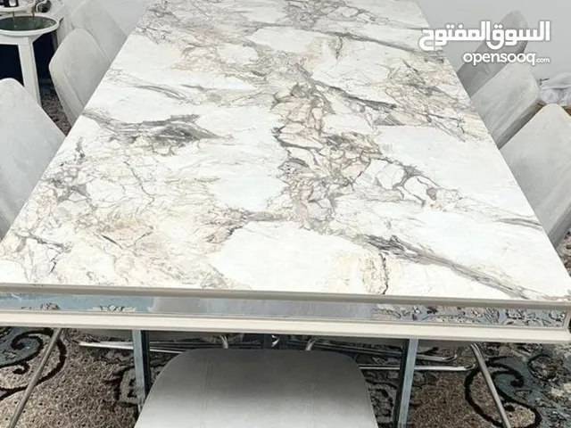 طاوله طعام 8كراسي بحالة ممتازه من النوع الممتاز
