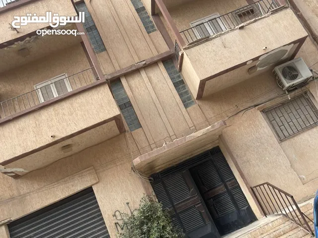 عمارة ثلاث طوابق في حي الصلابي قرب المستشفي العسكري المساحة 245 شهادة عقارية