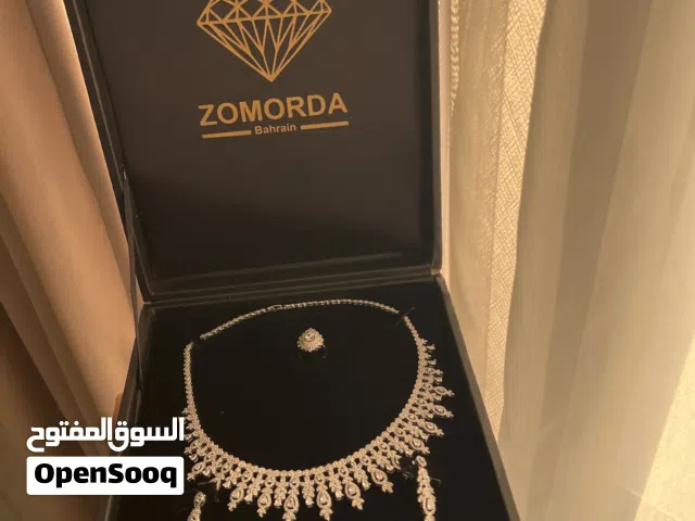 طقم فضه وزريكون