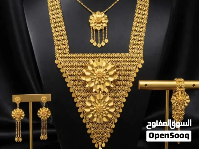 اطقم مطليات ذهب من موصوف للمجوهرات