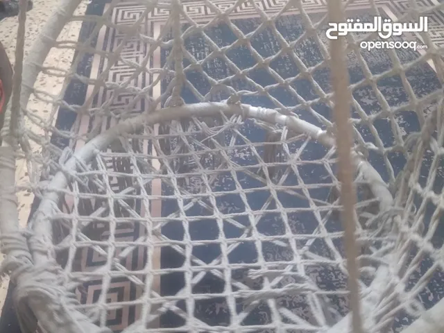 بسكليت مع مرجيحة مع حوض سمك بدل على عصافير كنار