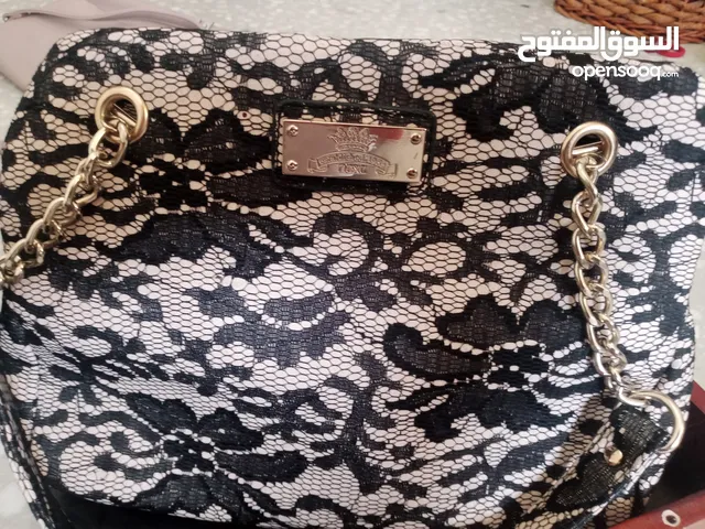 شنطة يد جميلة و لطيفه من شركة نكتس جميع الحقائب من ماركات عالمية