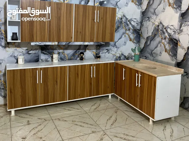كاونتر خشب تركي قياس مترين ارضي وملحق وسنك متر وعشرين. الحوض مرمر