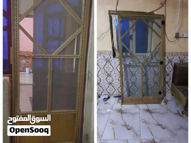 نجارة واعمال الأبواب والشبابيك والافقصاص والمحميات ودوشمه القنفات