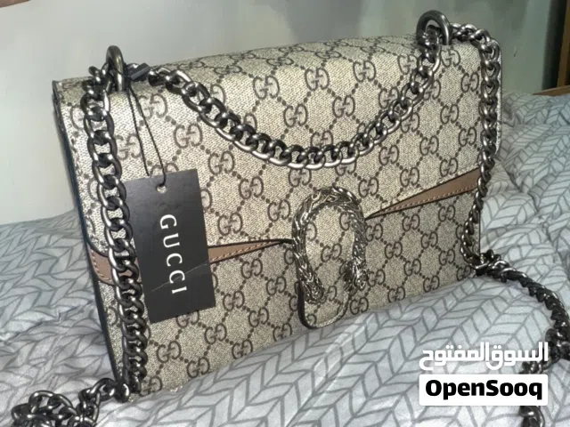 شنطة يد جوتشي