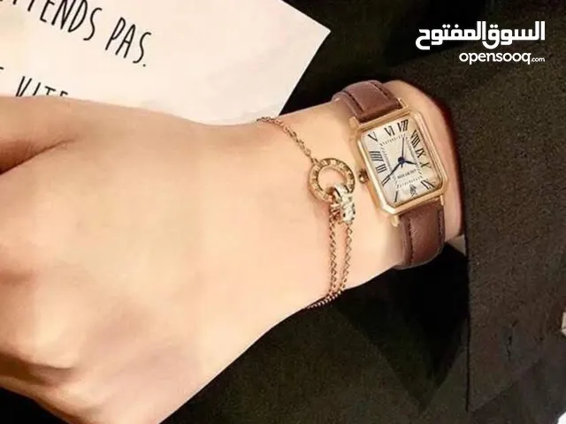 طاقم نسائي  (   ساعة وتعليقة)
