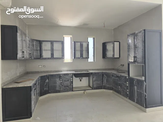 Kitchens and Wardrobes المطابخ وخزائن الملابس