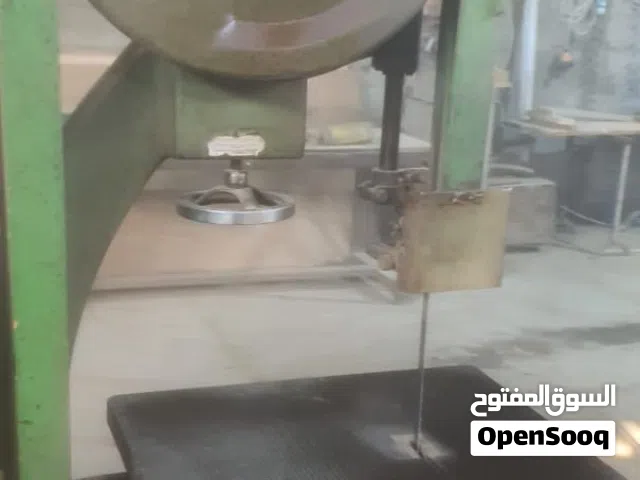 ماكنة نجارة ( منشار لولب )