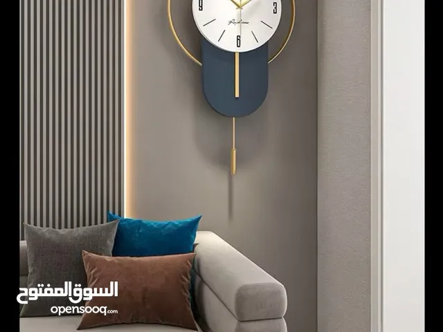 ساعات حائط منزلية بتصاميم فخمة