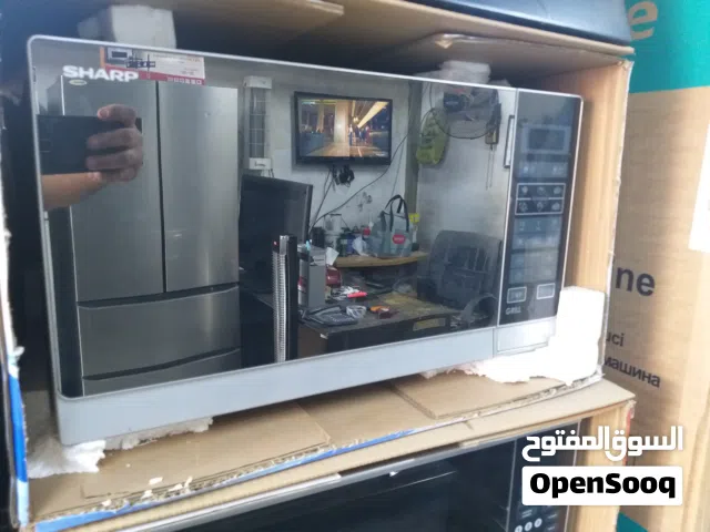 Sharp 25 - 29 Liters Microwave in Amman