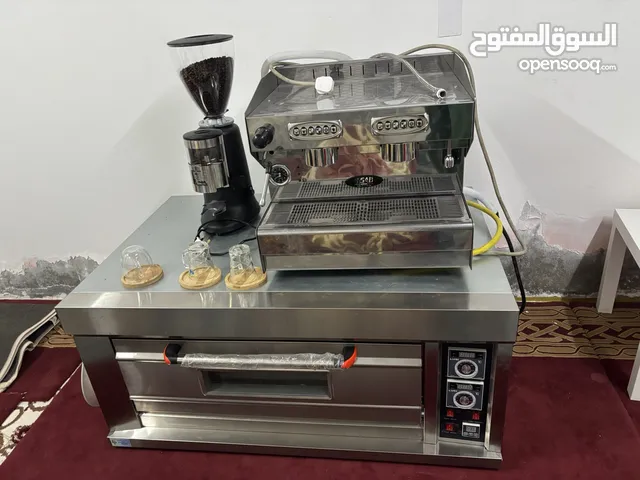 Coffee/espresso machine with grinder and pizza oven