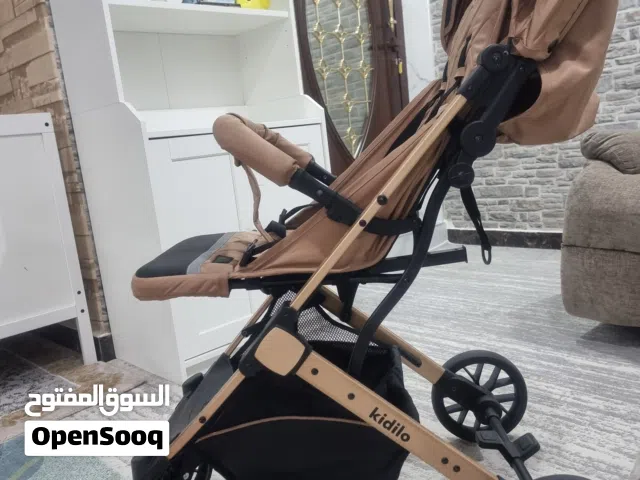 عربة أطفال kidilo أصلية، سعرها 25 دينارًا. استخدمت لمدة شهر واحد فقط.