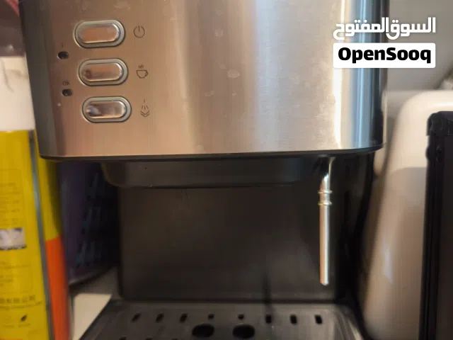 ماكينة قهوة إسبرسو منزلية من ماركة DSP، وتشتغل بالقهوة المطحونة