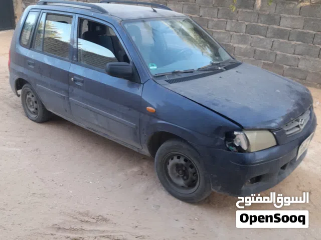 2003 مازدا 323