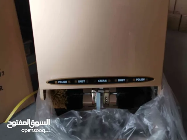 Shoe polishing machines