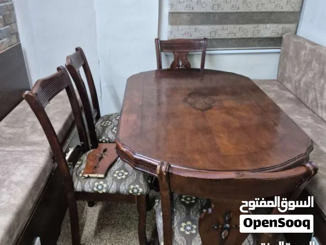 طقم كورنر خشب 4 متر و طاولة سفرة 4 كراسي