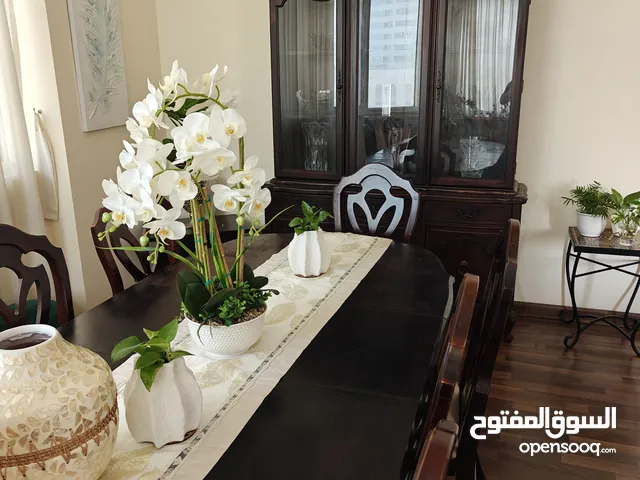 Classic Wooden Dining Set with Elegant Cabinet