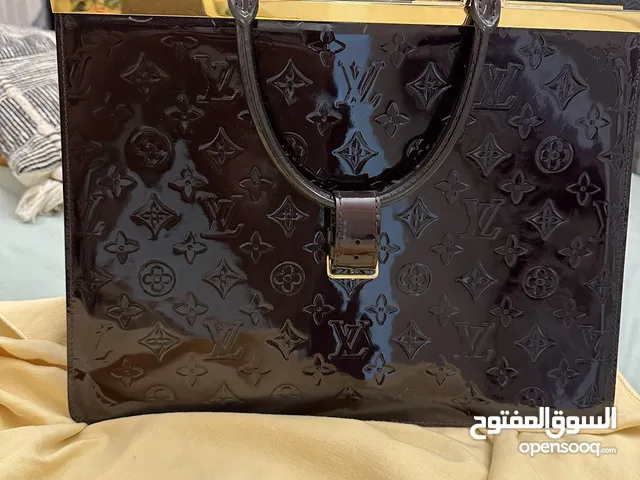 Burgundy Louis Vuitton for sale in Abu Dhabi