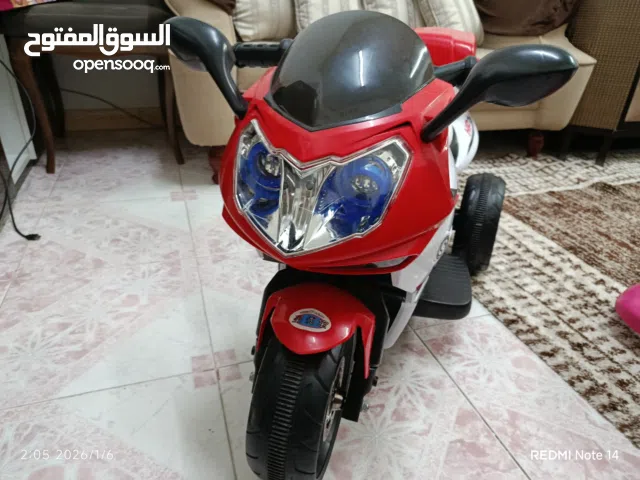 دراجة أطفال للبيع مع كراجه للأطفال