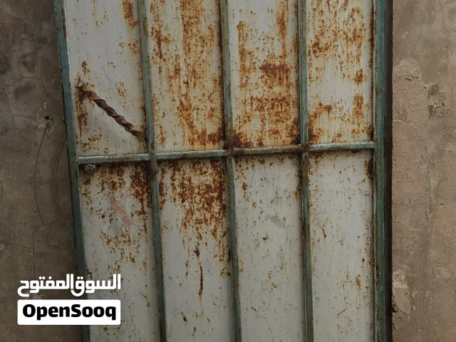 باب حديد بالقفص