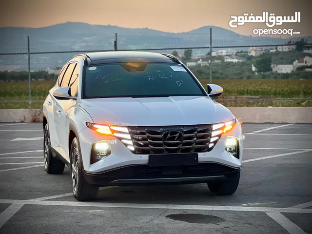 هونداي توسان 2023/ فل الفل فتحة سقف بانوراما 2x4 ///240Hp بنزين + كهرباء ( Haybrid) 1600cc