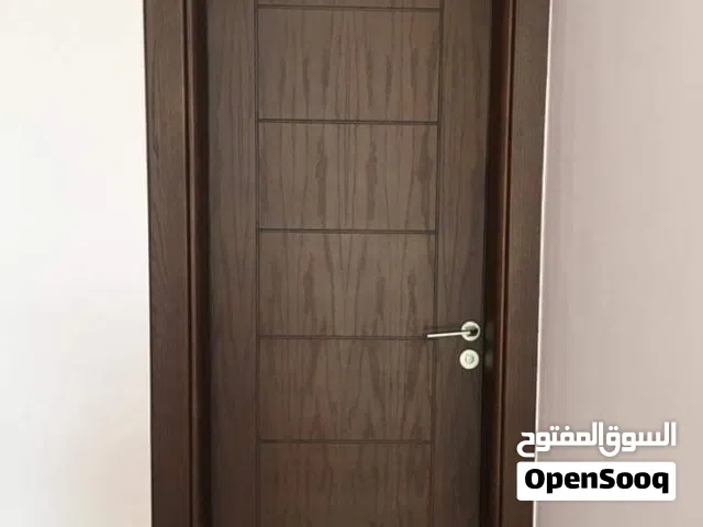 ابواب خشب قشرة بلوط تفصيل