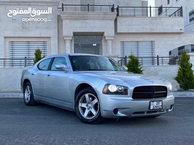 دودج تشارجر موديل 2009 لون سلفر بحالة ممتازة