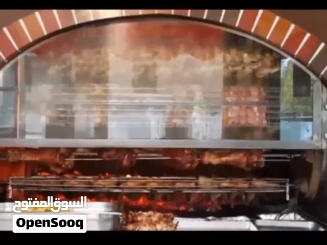 مطعم شواية دجاج على الحطب والفحم والحجر الناري شواية إيطالية