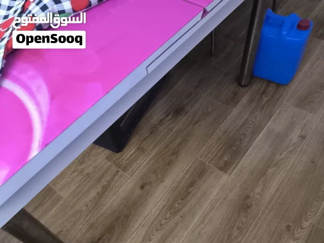 طاولة أكل قابلة للزيادة في الطول