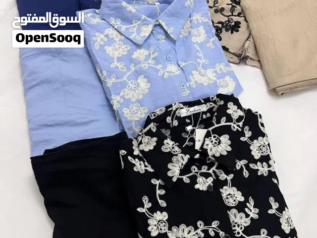ملابس طقم نسائي