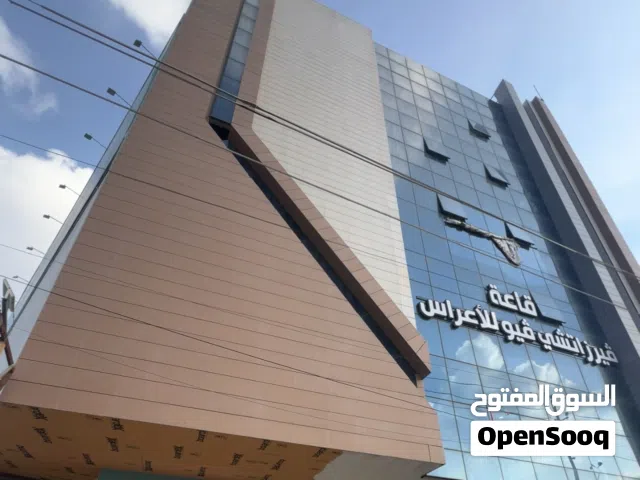 بنايه للبيع مساحه 900 بناء حديث  تحتوي على 7طوابق موجر معرض سيارات قاعه أعراس وغرف كيمنك