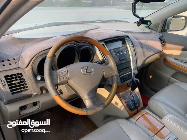 Lexus RX 350 -2008-gold-owned by a doctor