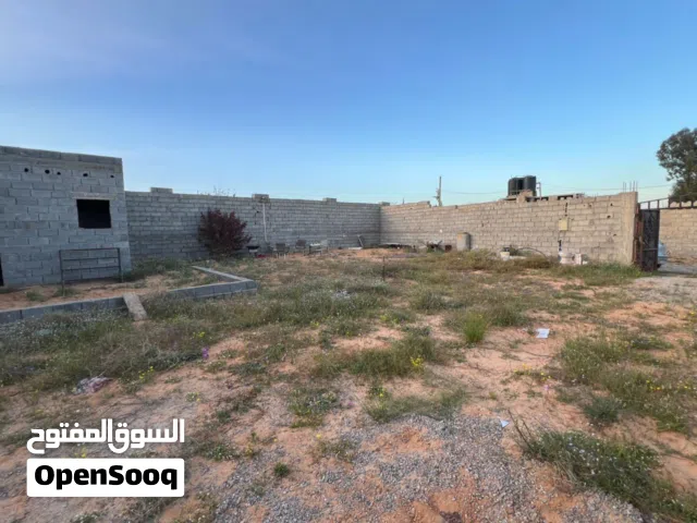 قطعة ارض  وجهتان 500 متر تاجوراء خلة فارس